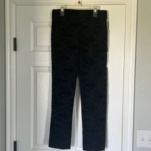 Erica Taylor black printed pants. Size Medium